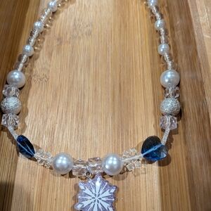 Elegant Blue and Silver Snowflake Necklace